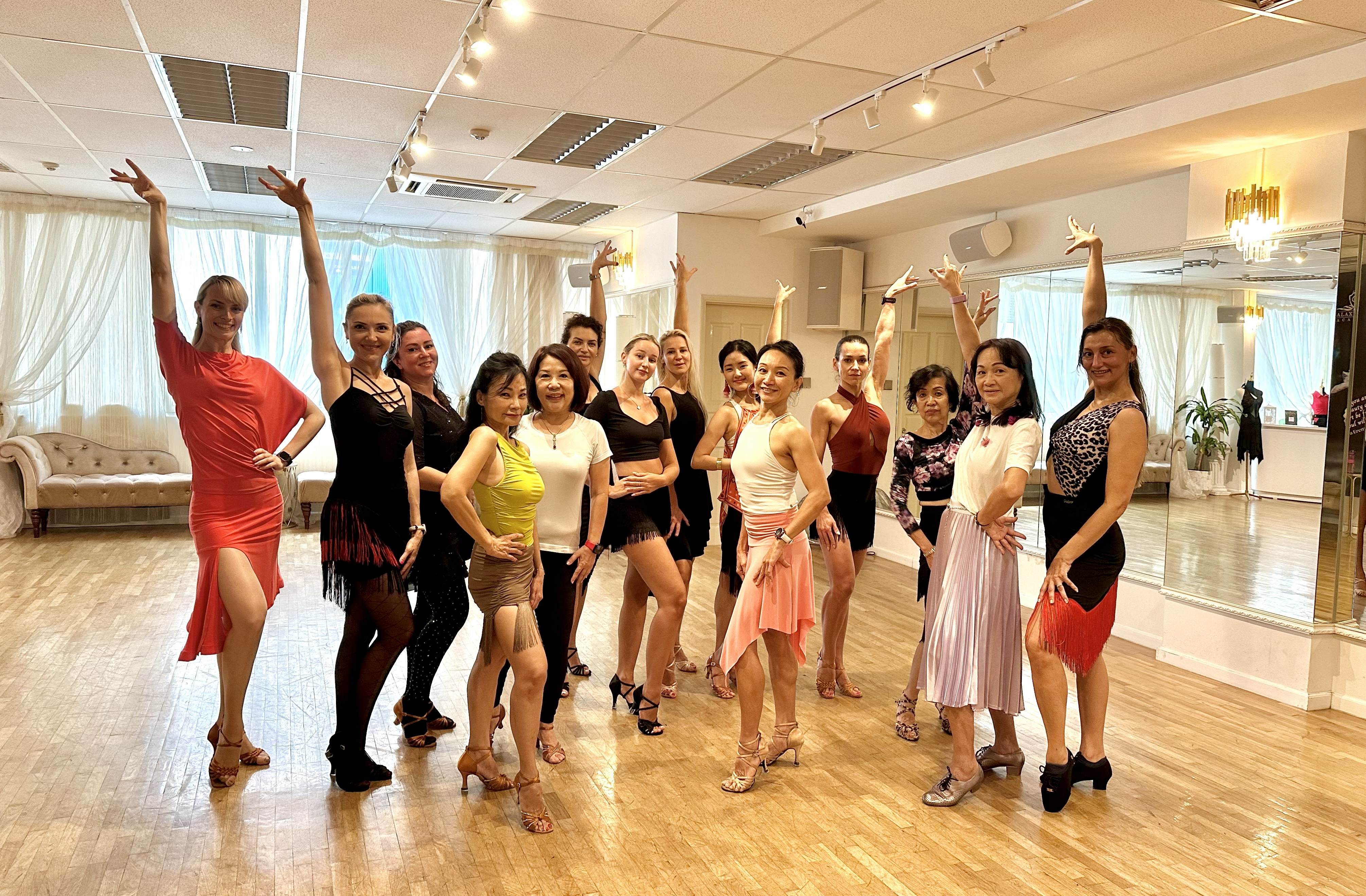 Galaxy Dance Academy main studio with polished wooden floor and mirrored walls